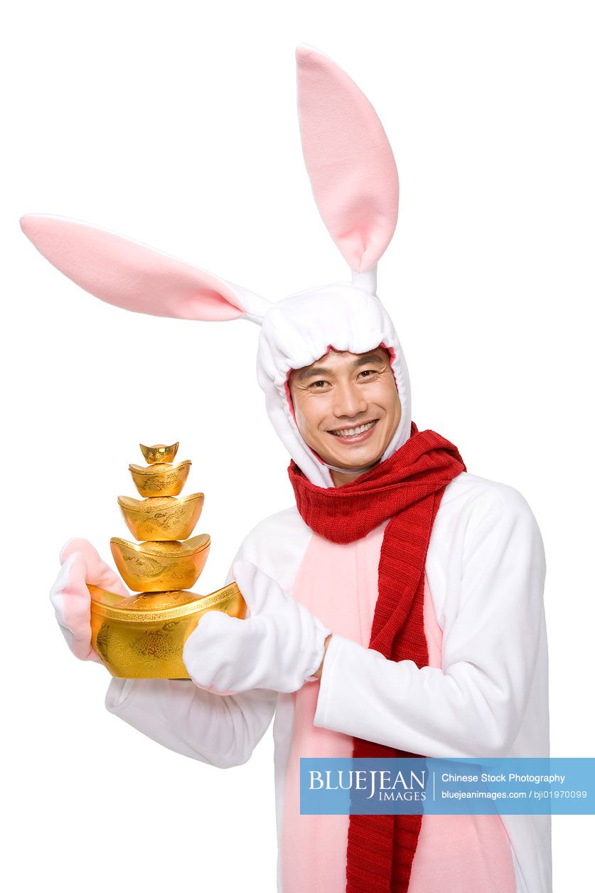 Mid-adult Chinese man celebrating the Year of the Rabbit