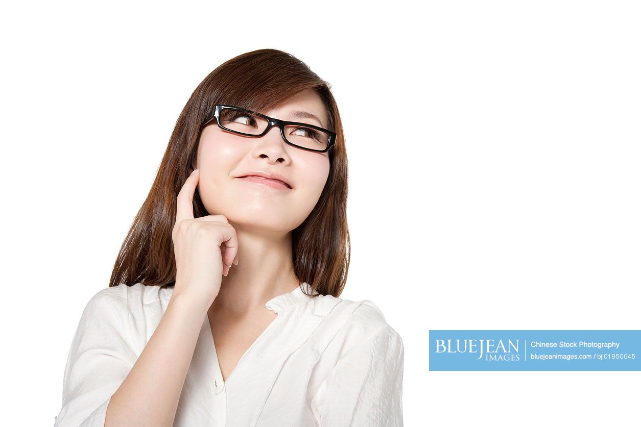 Portrait of young Chinese woman with an idea