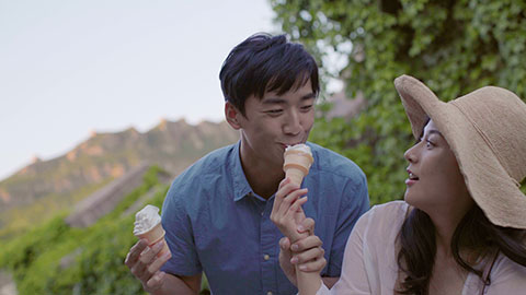 Happy young Chinese couple eating ice cream,4K