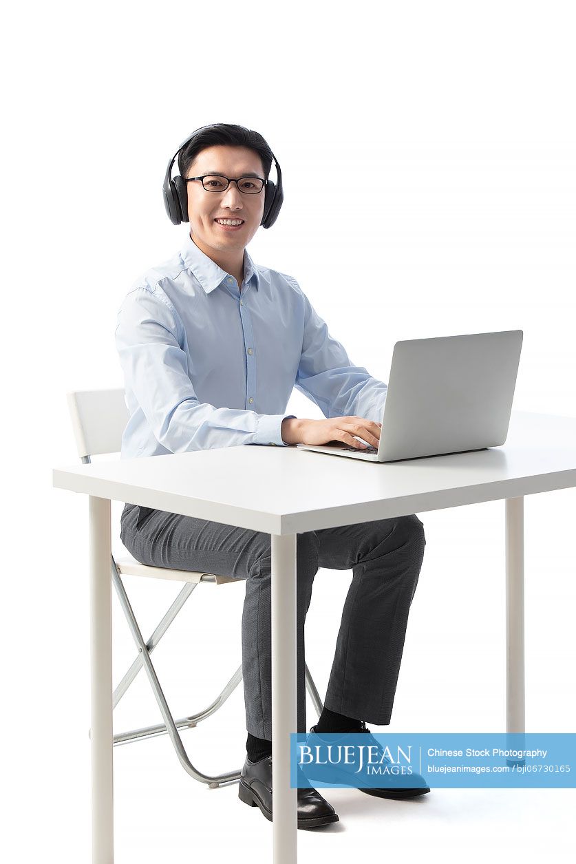 Chinese male teacher working online
