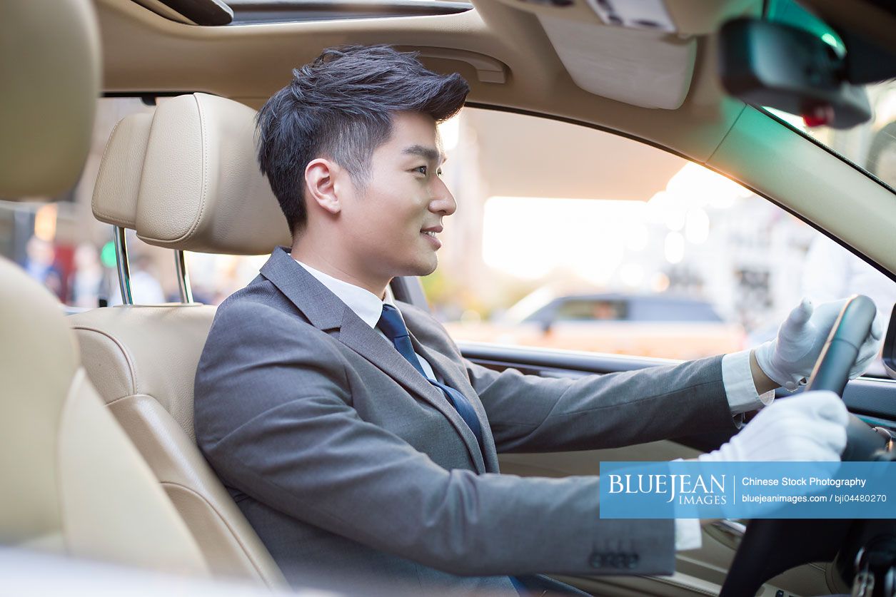 Chinese chauffeur driving car