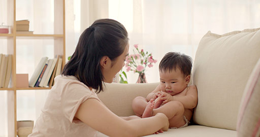 Young Chinese mom having fun with baby girl,4K