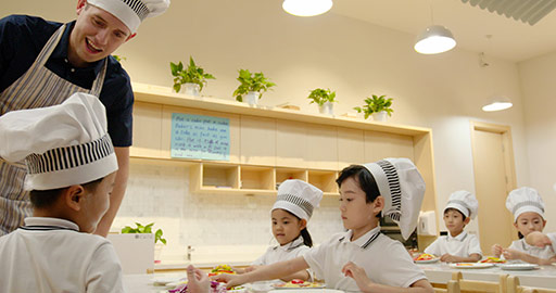 Children learning cooking in kindergarten classroom,4K