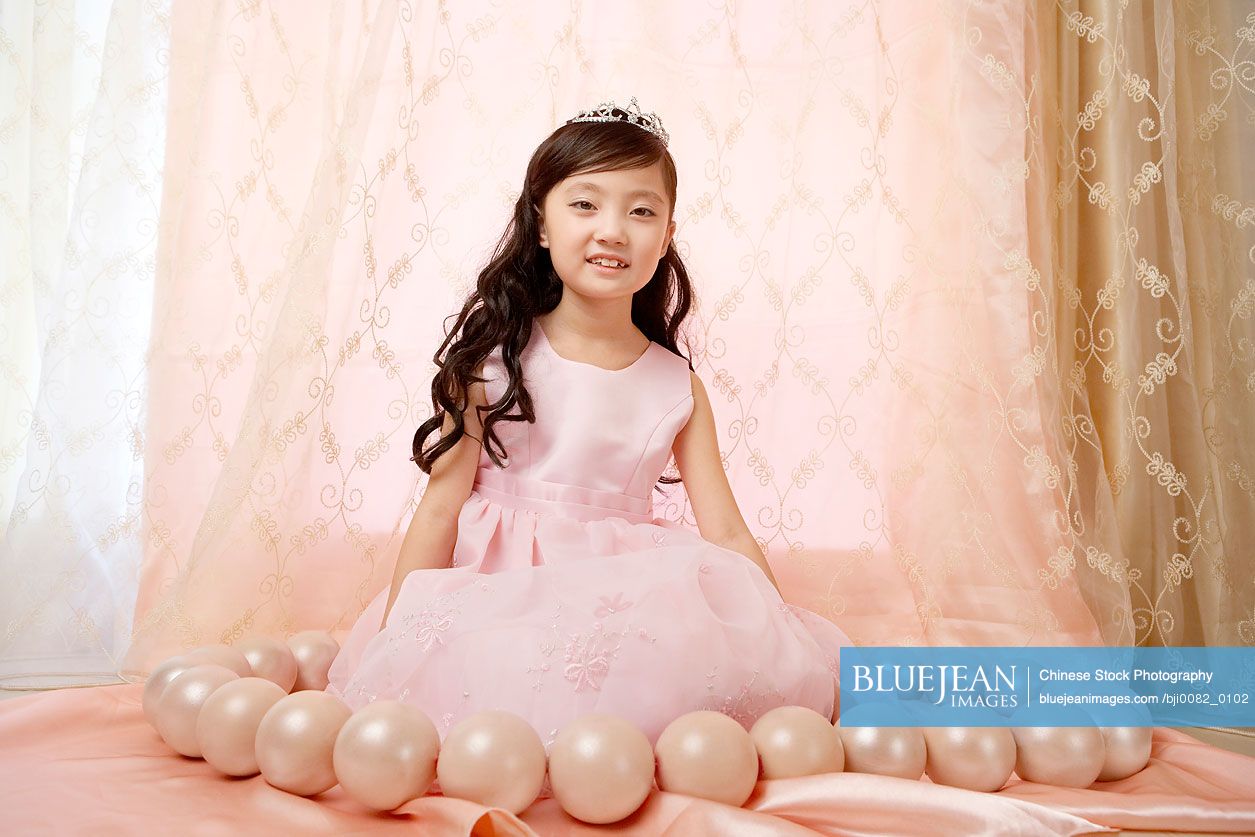 Chinese girl with oversized bead necklace