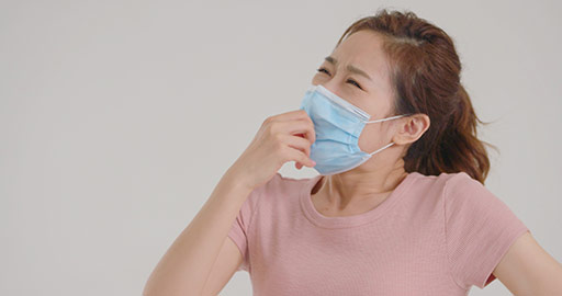 Young Chinese woman with surgical mask in pain,4K