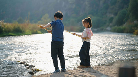 Cute Chinese Children having fun outdoors