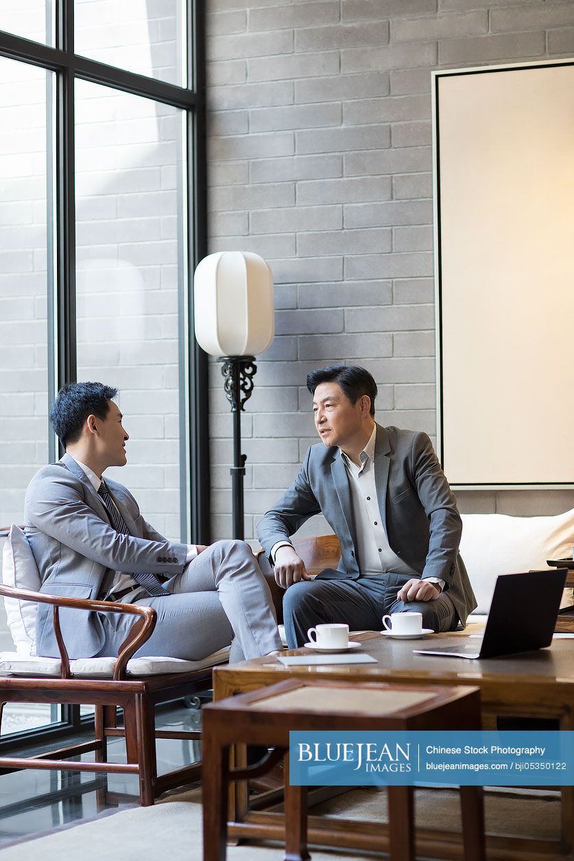 Chinese businessmen having a meeting