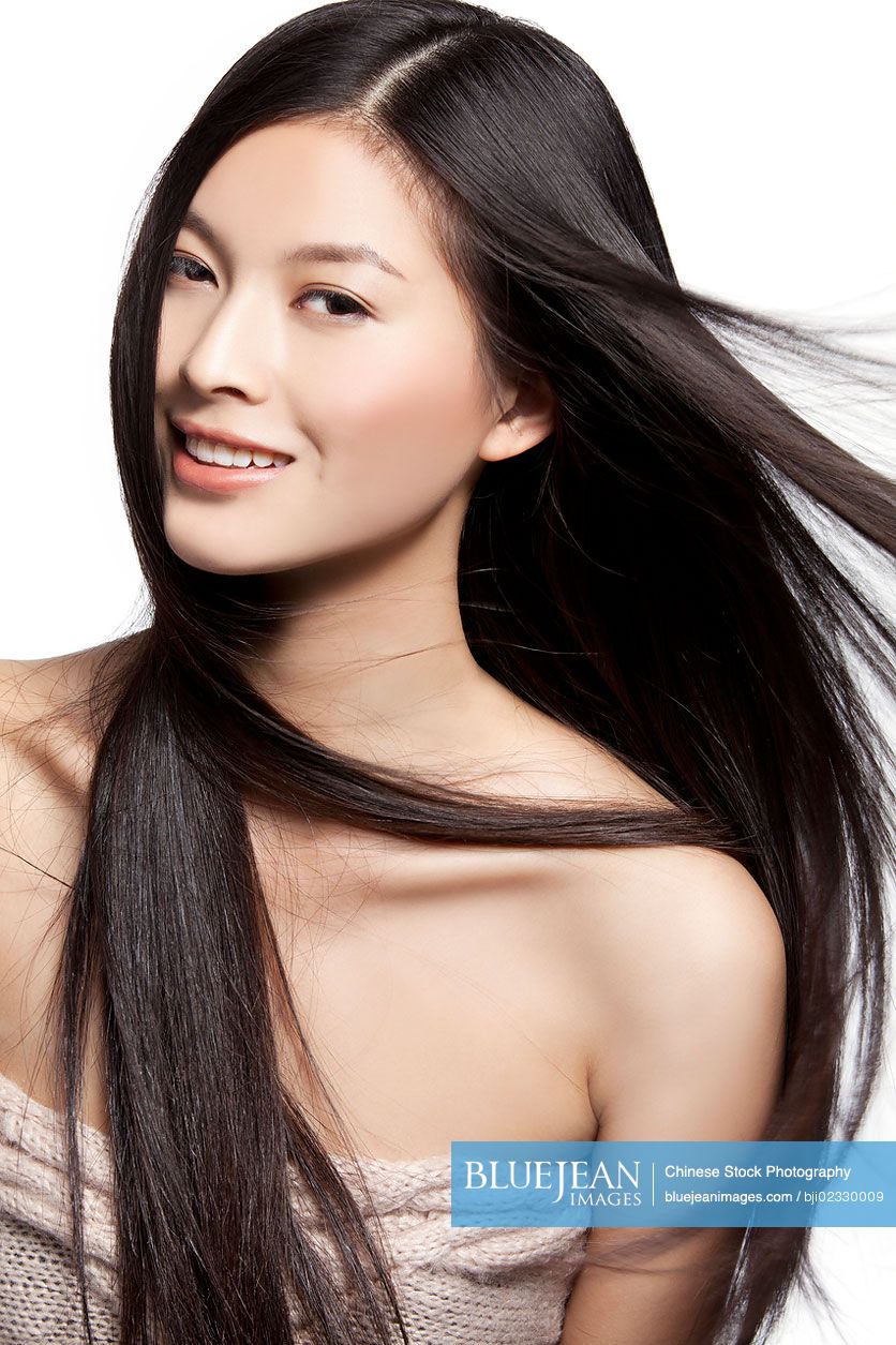 Young Chinese woman with long silky hair