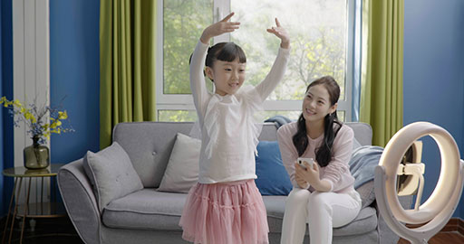 Little girl dancing on a live stream