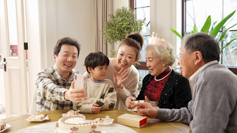 Family celebrating birthday with joy and laughter