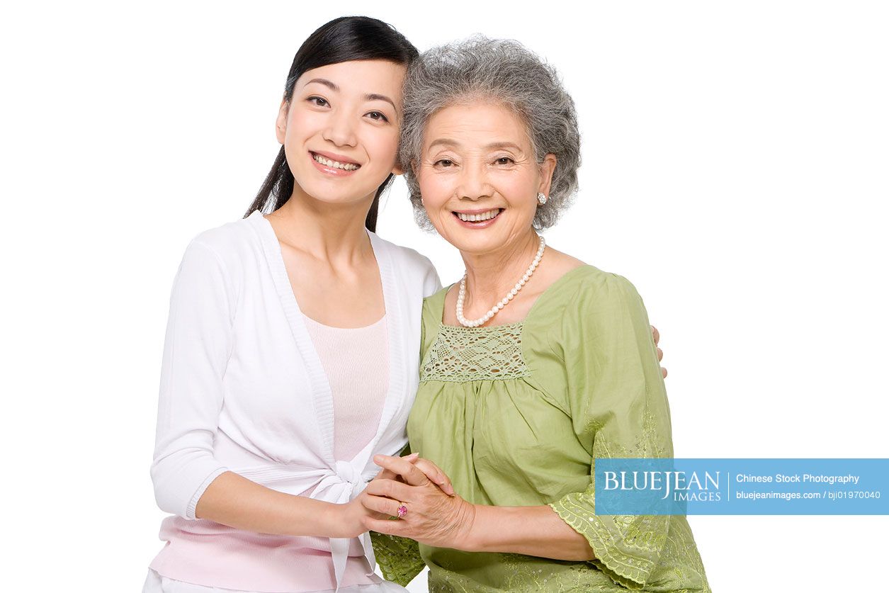 Portrait of Chinese mother and adult daughter