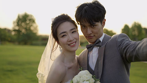 Happy bride and groom taking a selfie