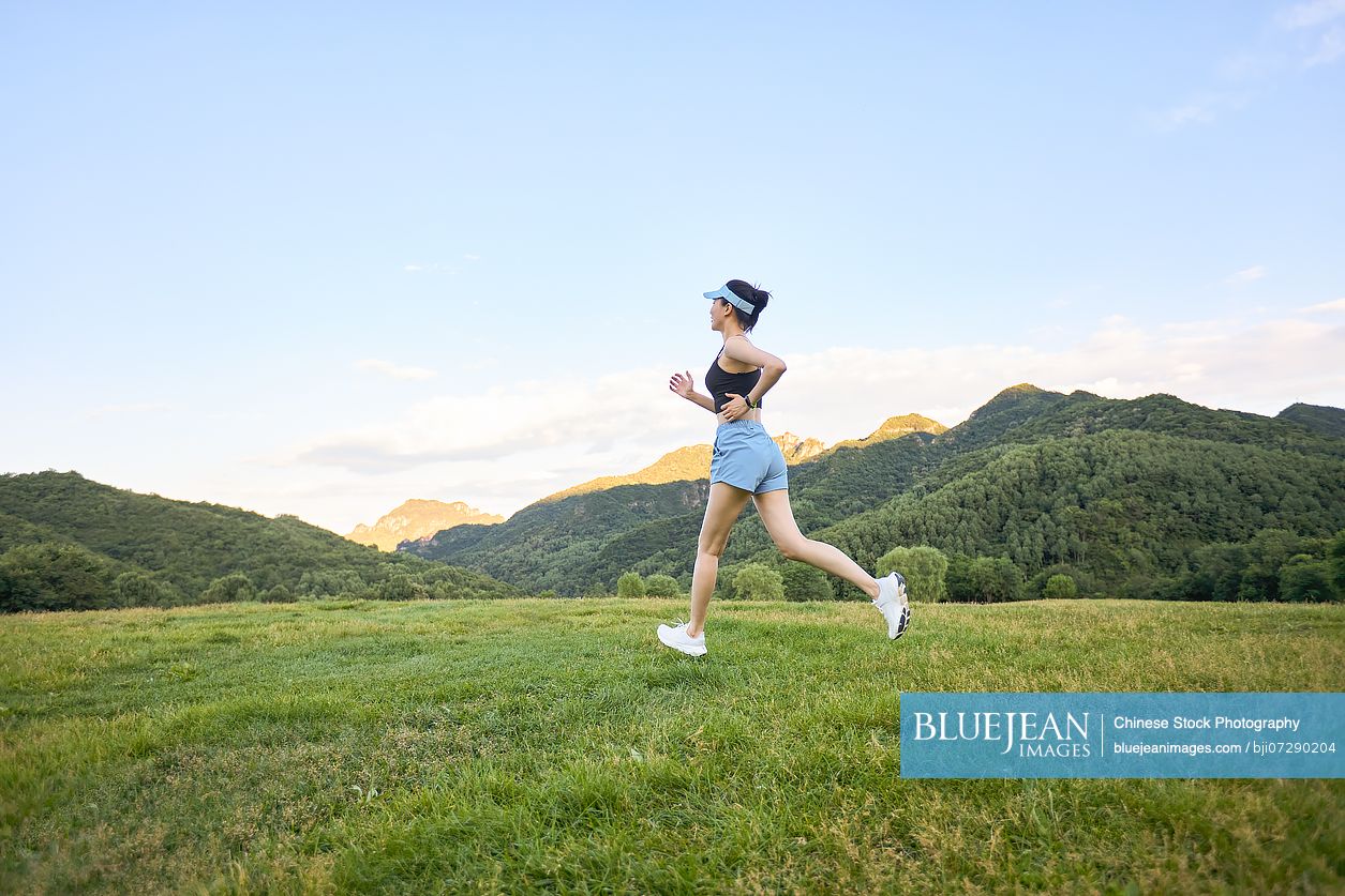 Young woman exercising in the heart of nature embracing the fresh air and natural surroundings