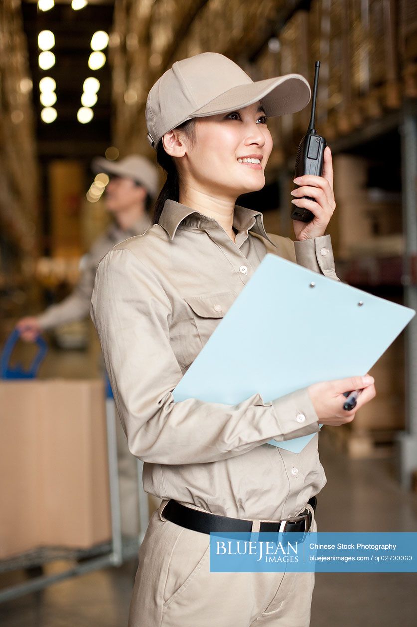 Female Chinese Workers With Walkie Talkie High Res Stock Photo For Download