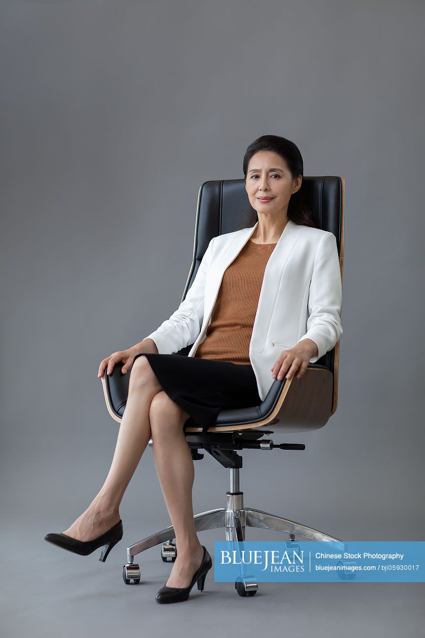 Confident mature Chinese businesswoman