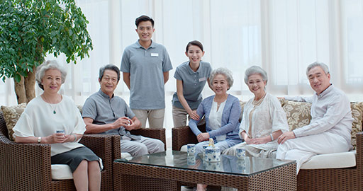 Happy senior Chinese friends drinking tea in nursing home,4K