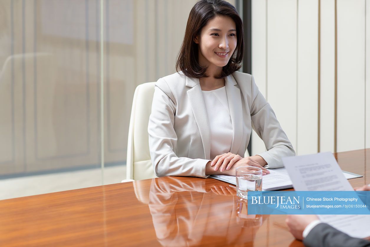 Young Chinese businesswoman in job interview-High-res stock photo for ...