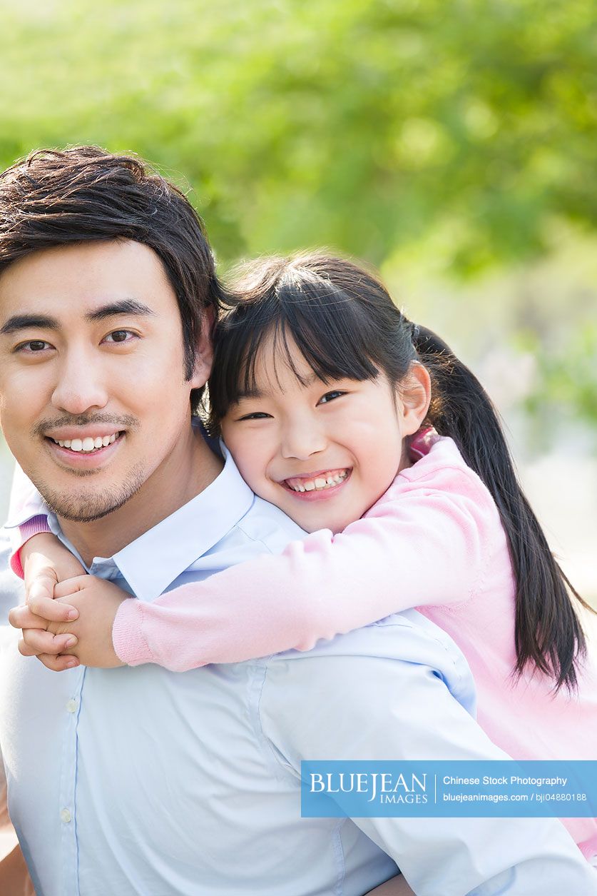 Happy Chinese father and daughter