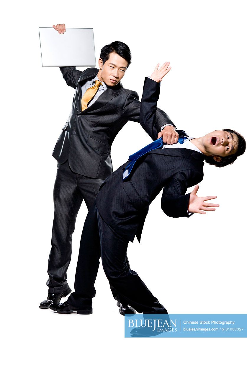 Two Chinese businessmen fighting