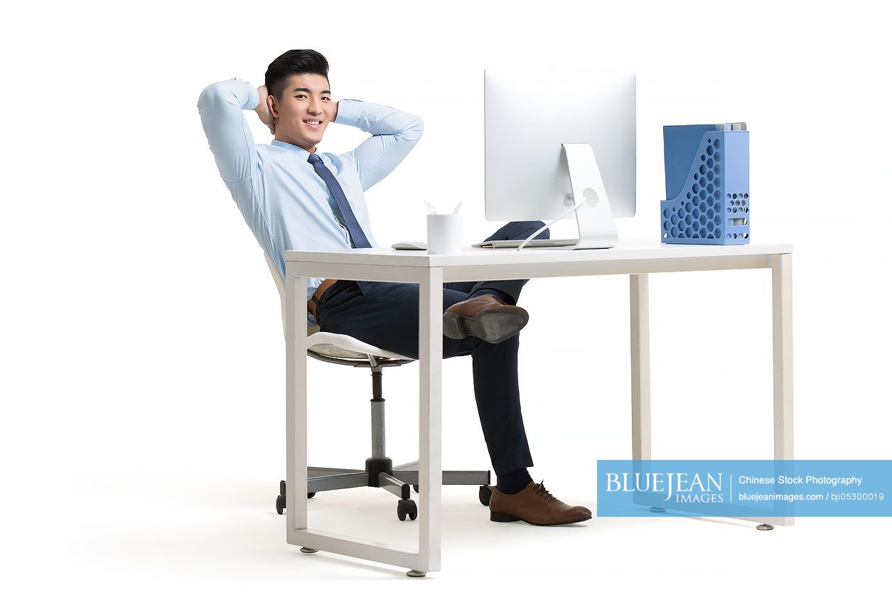 Young Chinese Businessman Working With Computer In Office-High-res ...