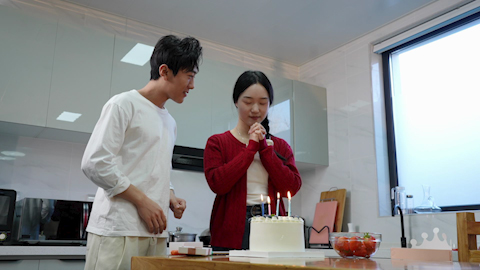 Young couple enjoying a special birthday celebration