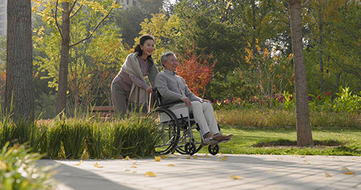 Senior Chinese woman with wheelchair bound husband,4K