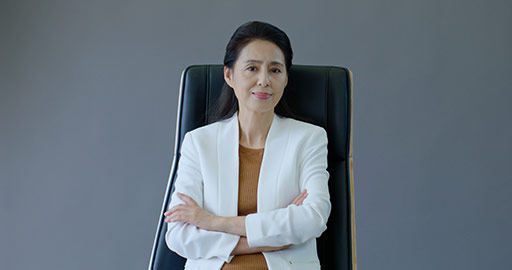 Successful Chinese businesswoman sitting on chair,4K