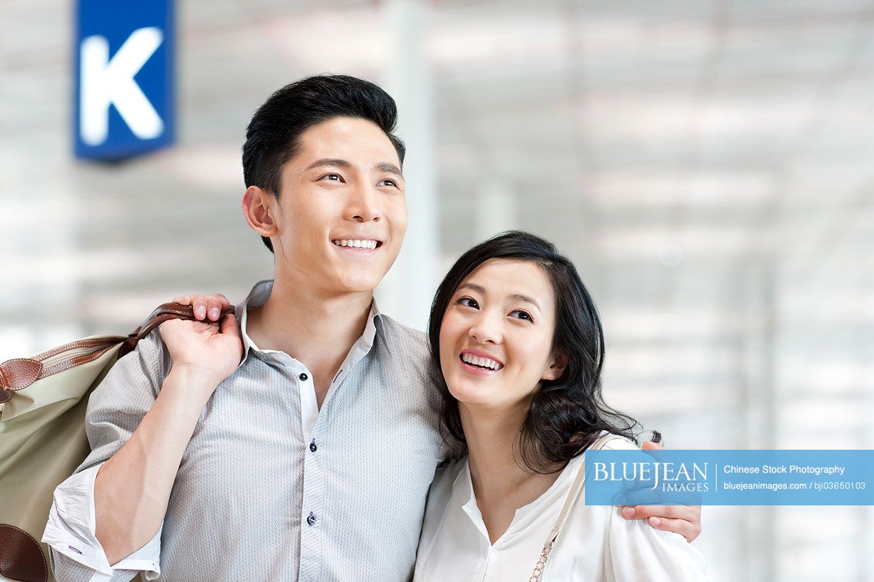 Chinese young couple at the airport