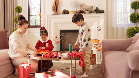 Family joyfully celebrating Chinese New Year together
