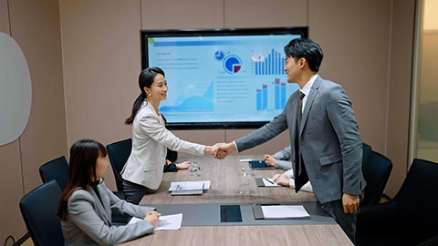 Confident Chinese business people having a meeting