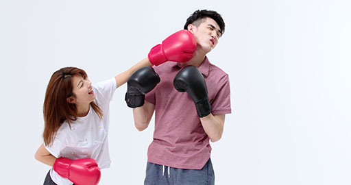 Humorous young Chinese couple practicing boxing,4K