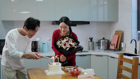 Young couple enjoying a special birthday celebration