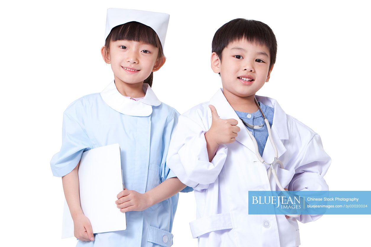 Chinese boy and girl playing dress up