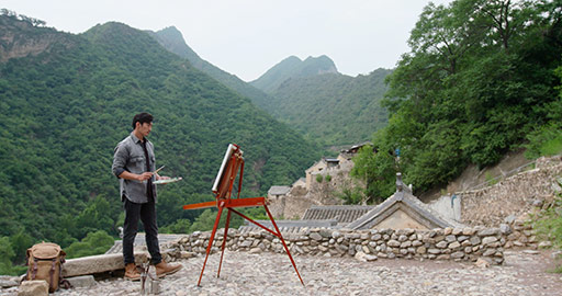 Young Chinese man painting outdoors,4K