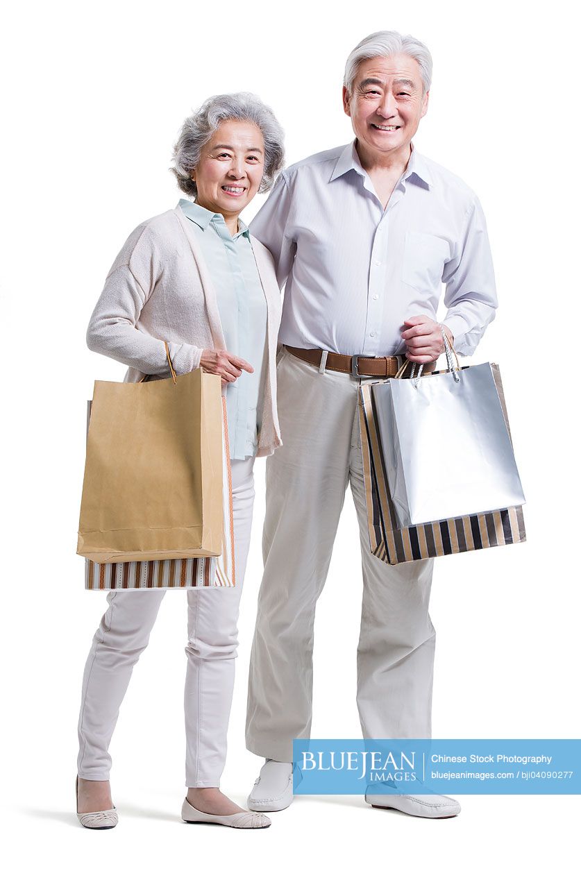 Senior Chinese couple shopping