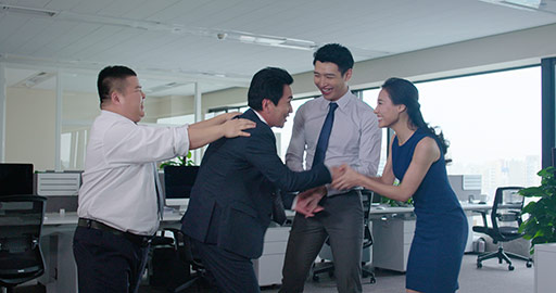 Chinese business people celebrating success in office,4K