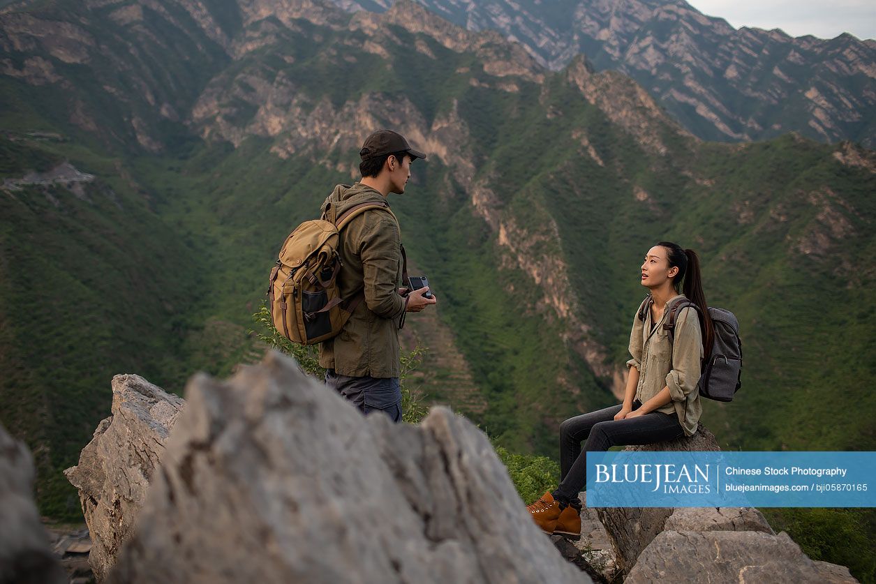 Young couple hiking outdoors