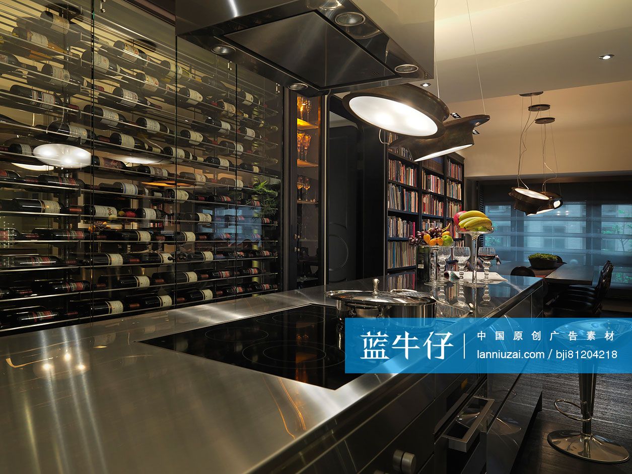 Alcohol bottles in glass rack and stainless steel bar counter with ...