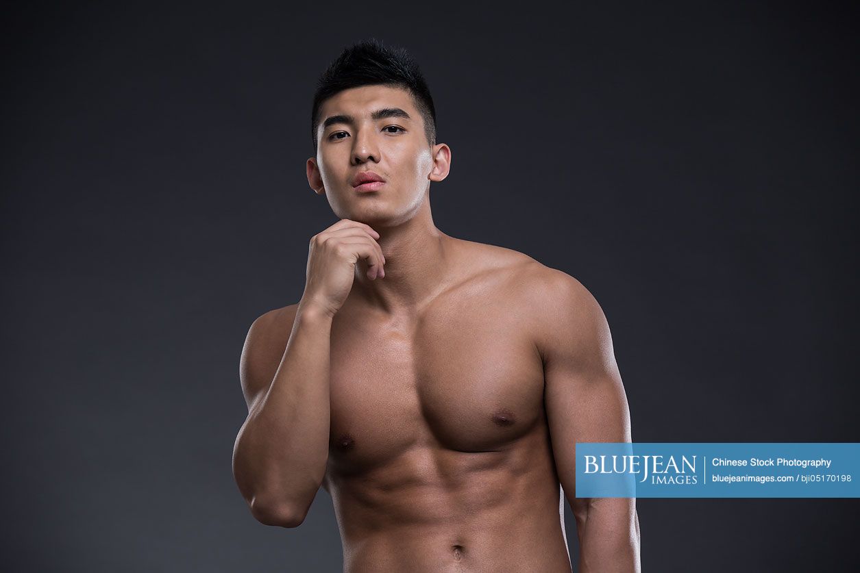 Portrait of young Chinese muscular man-High-res stock photo for download