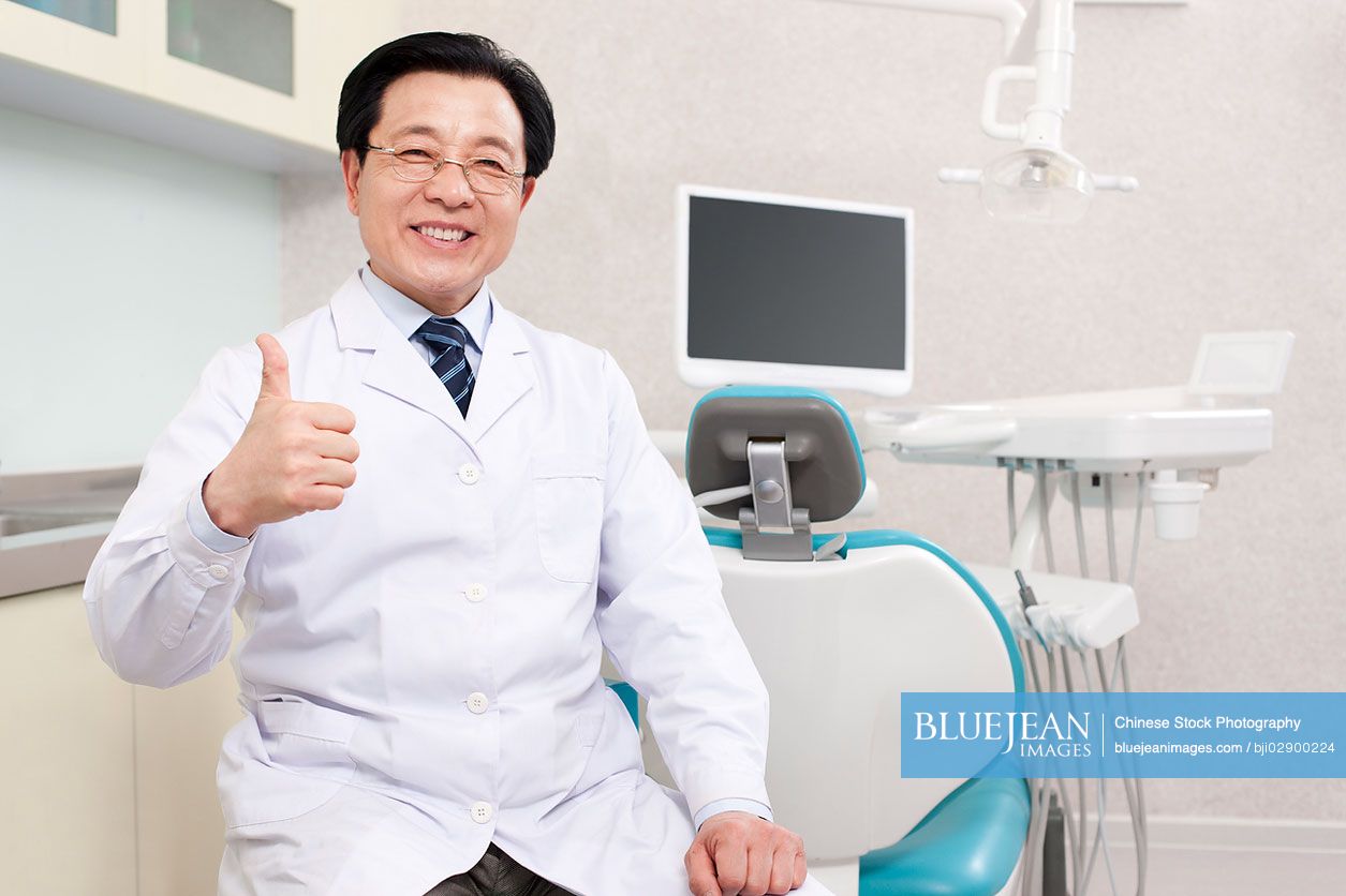 Chinese dentist in dental clinic