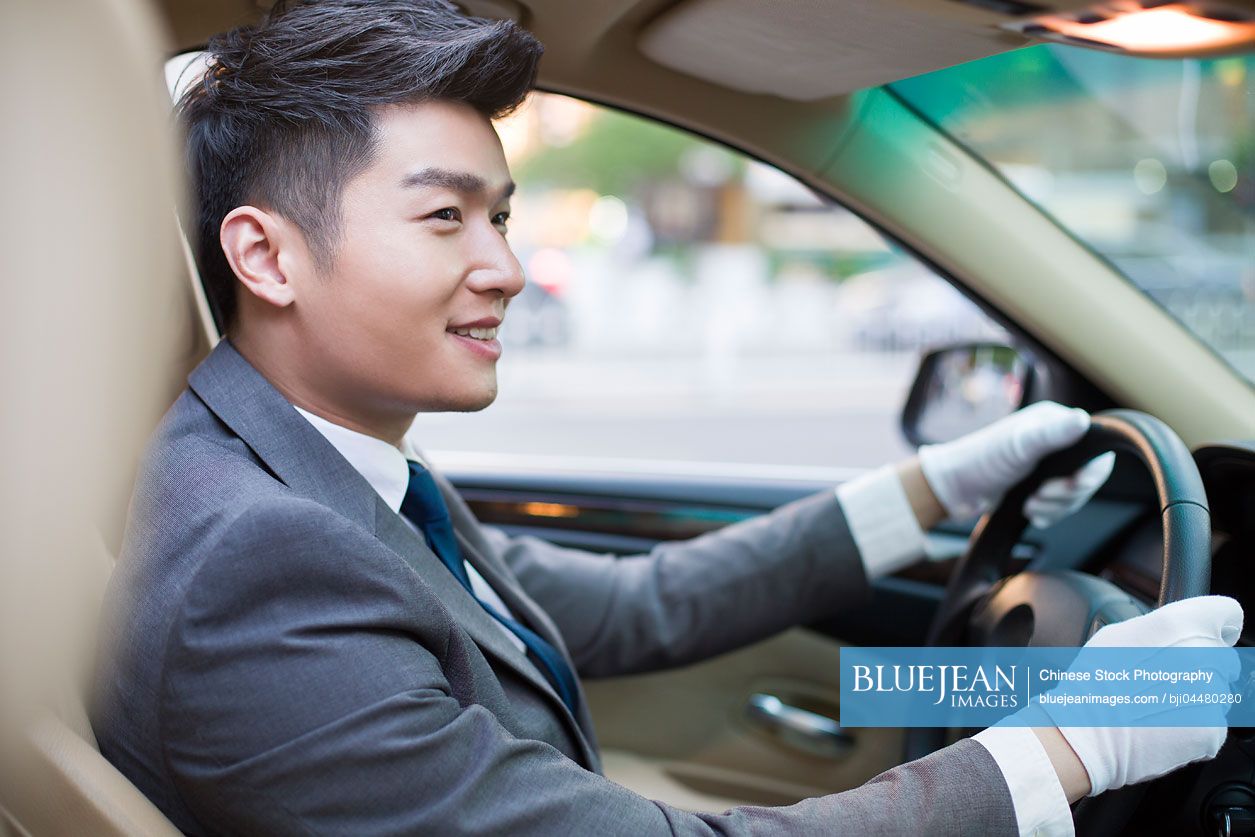 Chinese chauffeur driving car