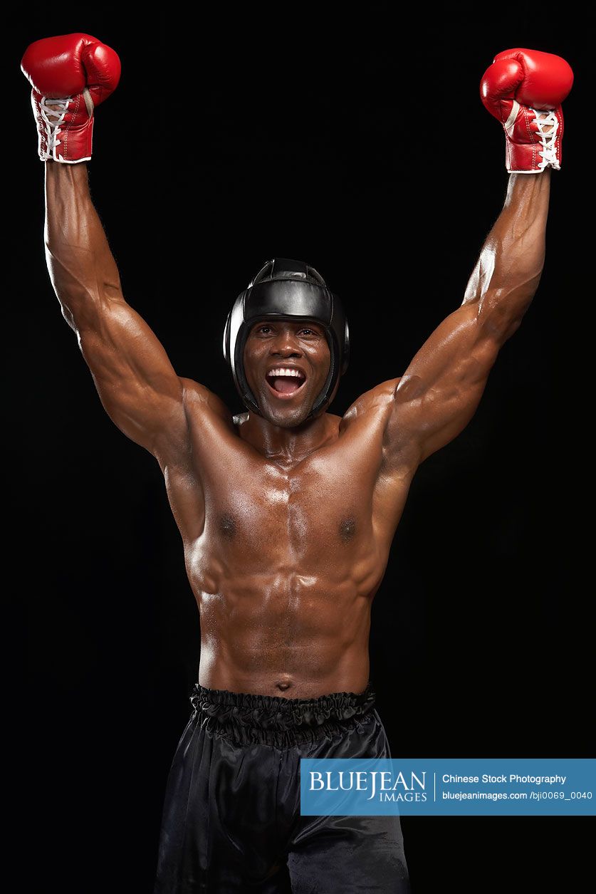 Boxer With Arms Raised Celebrating Victory