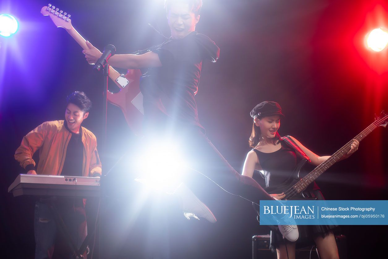 Young Chinese musical band on stage