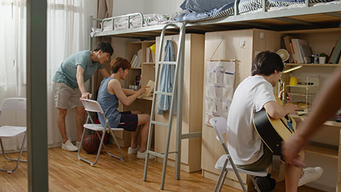 Young Chinese university students relaxing in dormitory,4K