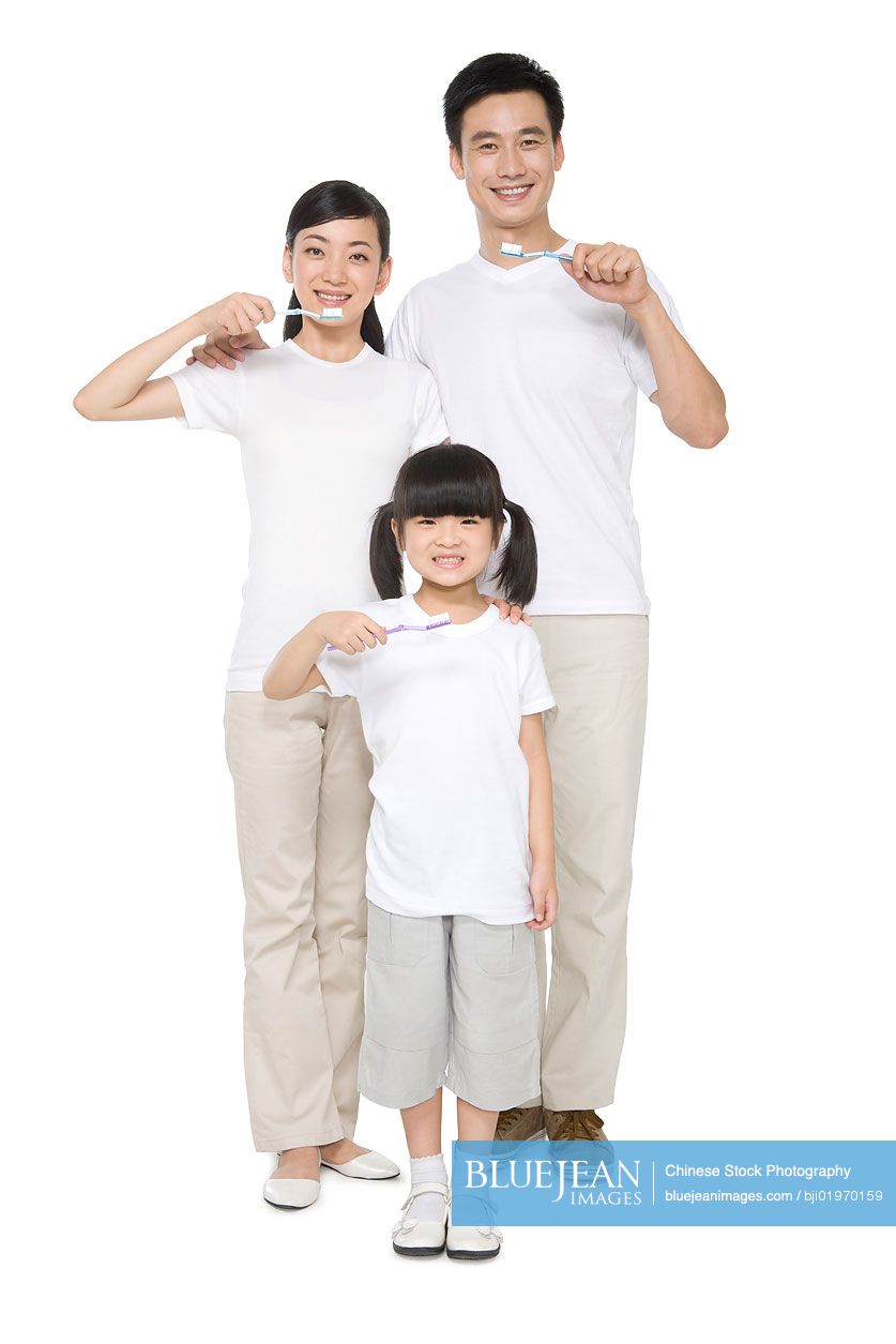 Chinese family brushing teeth