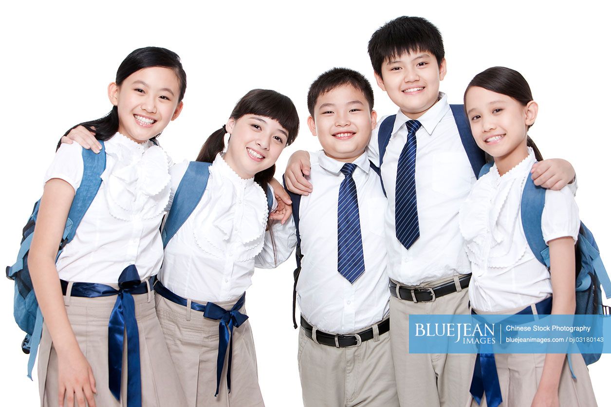 Portrait of happy Chinese primary school friends