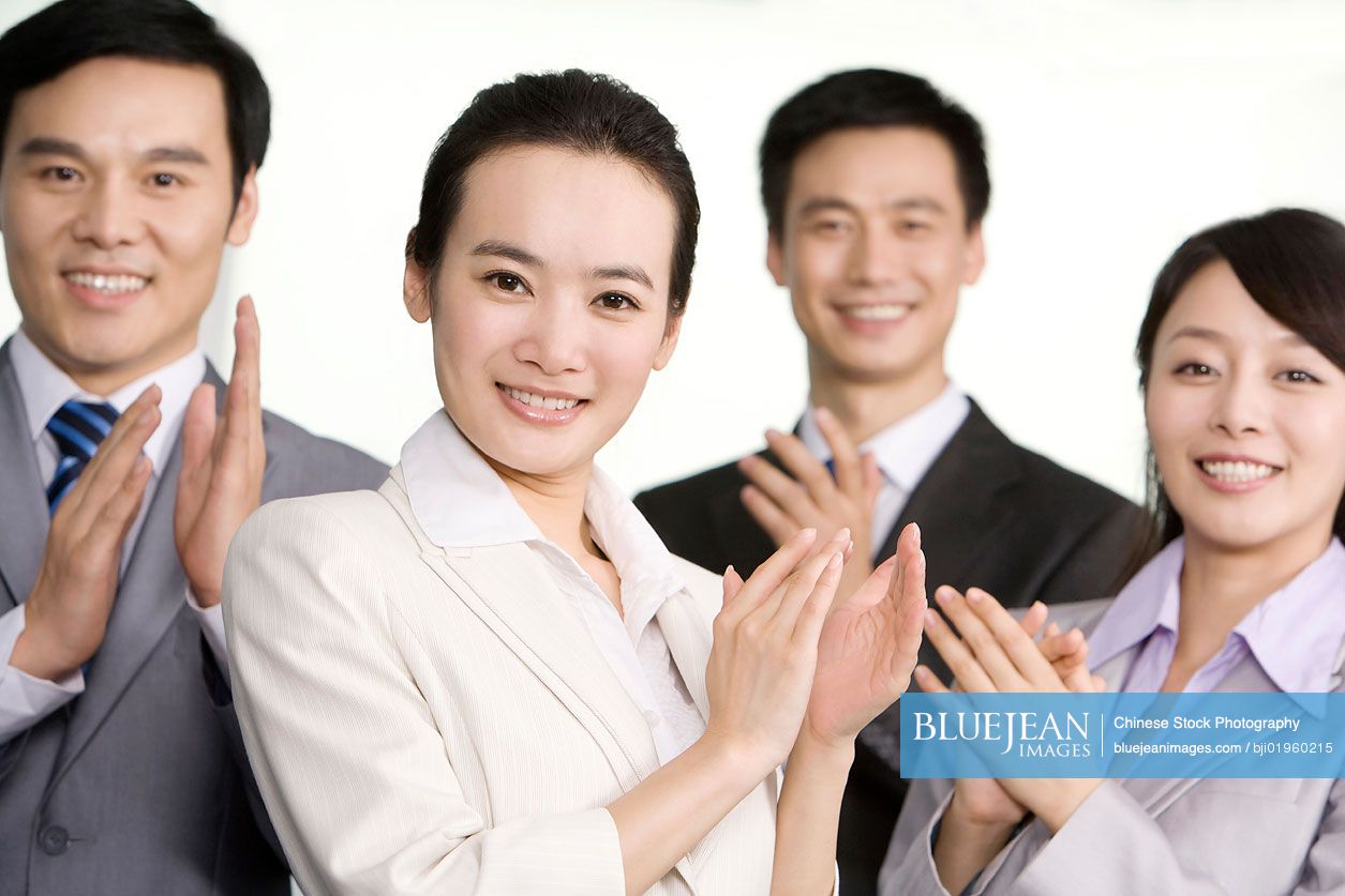 Cheering Chinese office workers