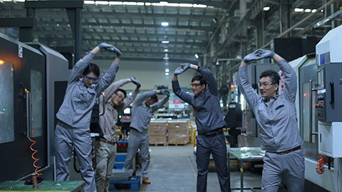 Chinese engineers stretching in factory,HD