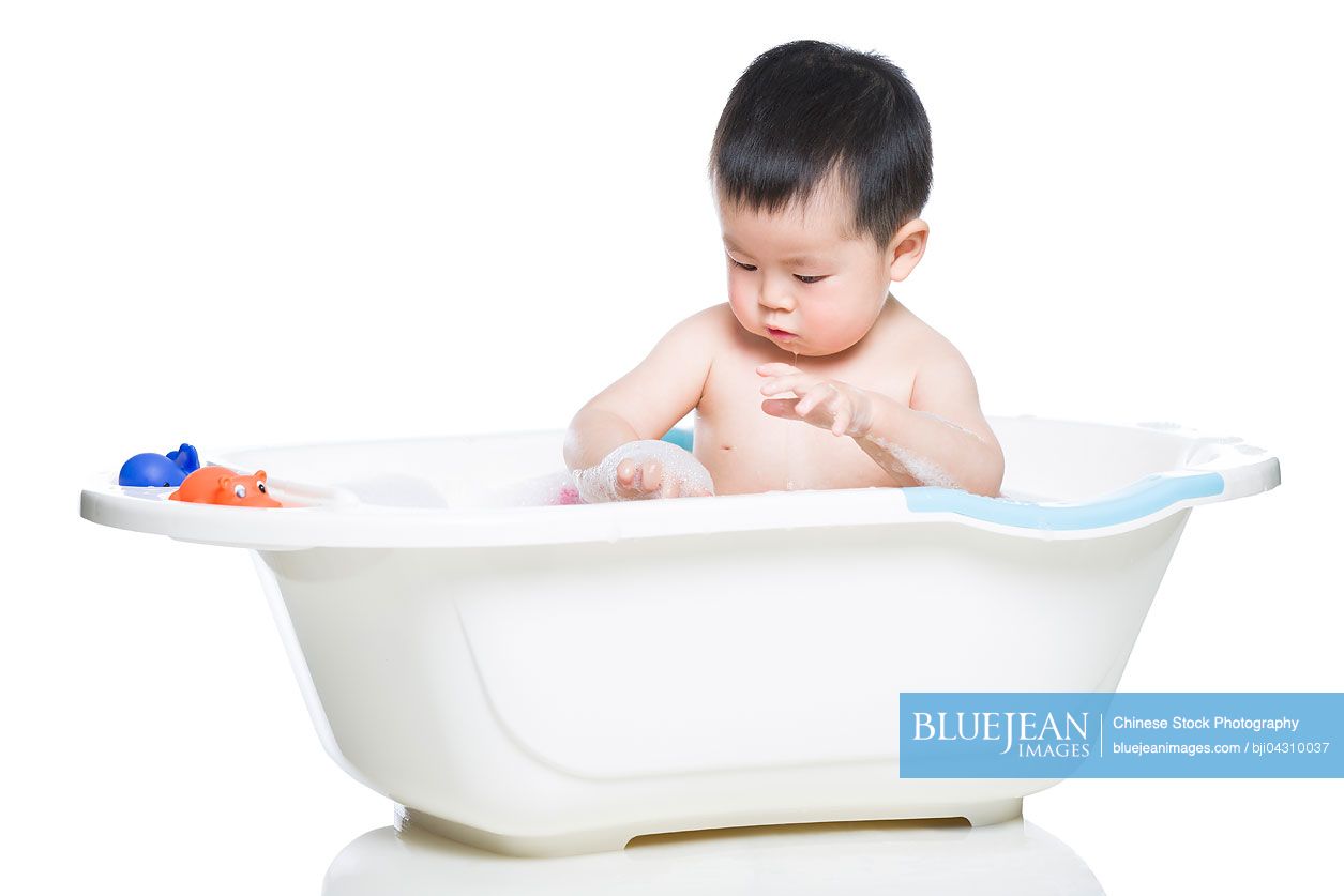 Cute Chinese baby in bathtub