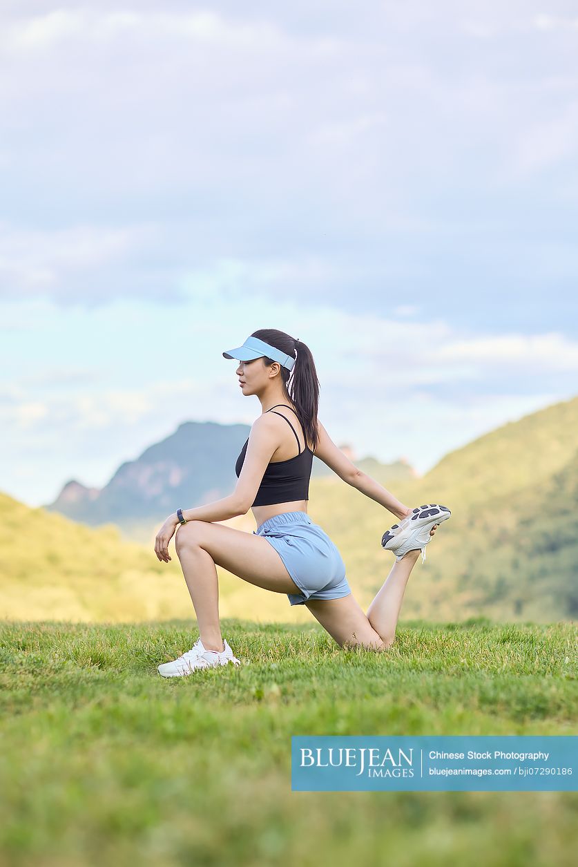 Young woman exercising in the heart of nature embracing the fresh air and natural surroundings